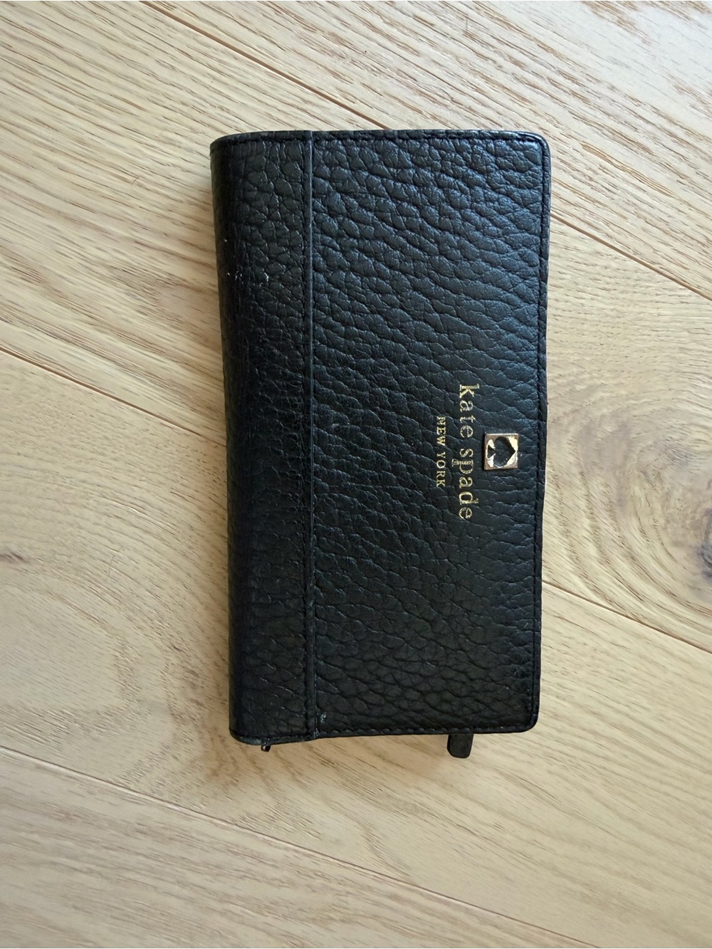 kate spade Black Pebbled Leather Continental Wallet with Gold Logo